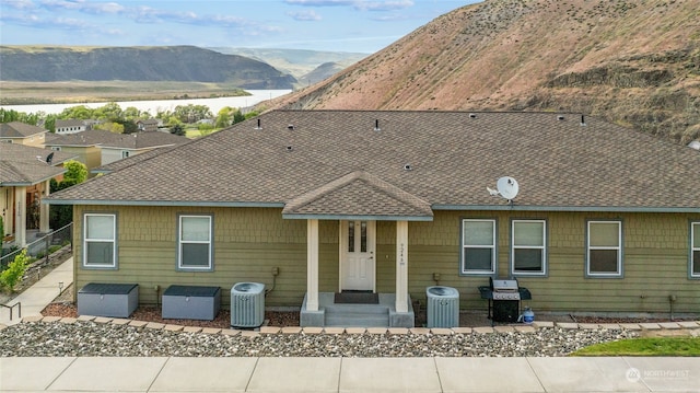 9246 Red Cliff Dr NW Unit B66, Quincy, WA 98848 - exterior space featuring a mountain view and central air condition unit