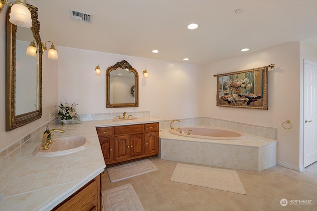 bathroom with tile flooring, a relaxing tiled bath, and double sink vanity