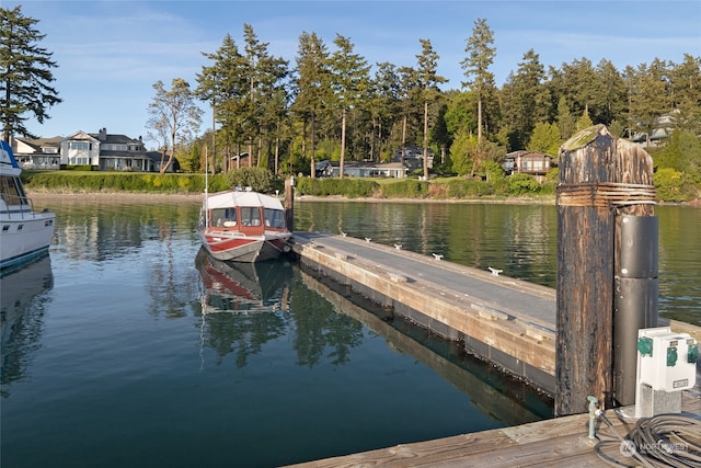 view of dock with a water view