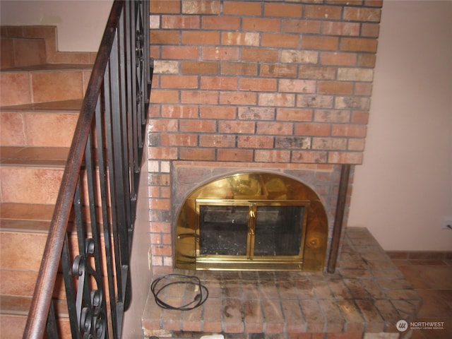 details with a brick fireplace