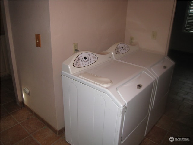 laundry room featuring independent washer and dryer and tile flooring