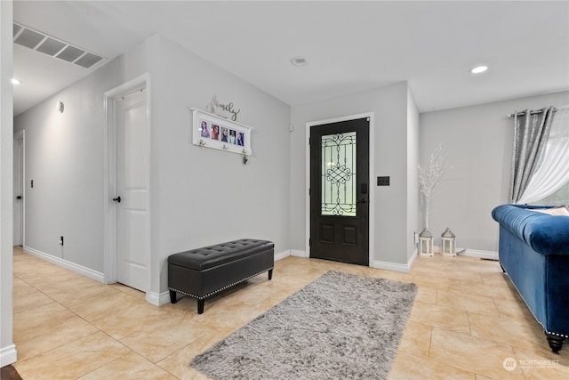 view of tiled foyer entrance