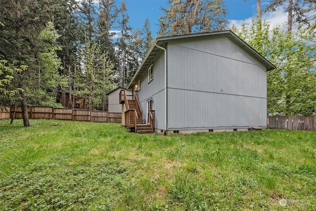 view of shed / structure featuring a yard