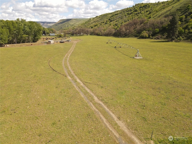 aerial view featuring a mountain view and a rural view