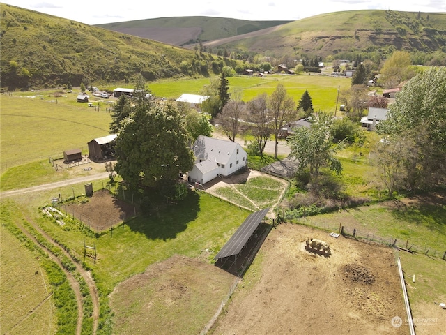 bird's eye view with a rural view and a mountain view