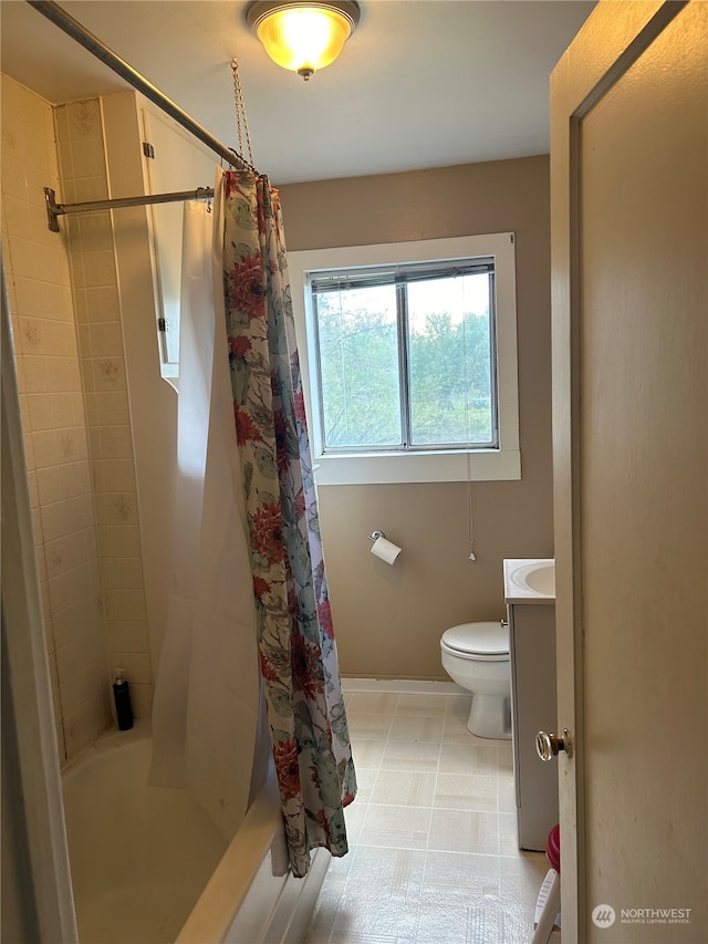 full bathroom featuring vanity, tile floors, shower / bathtub combination with curtain, and toilet