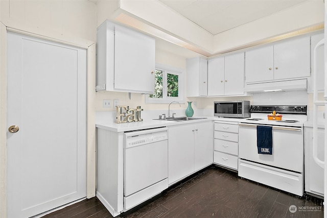 kitchen featuring white cabinetry, dark wood-type flooring, white appliances, and sink