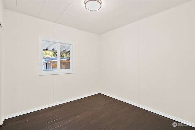 empty room featuring hardwood / wood-style flooring