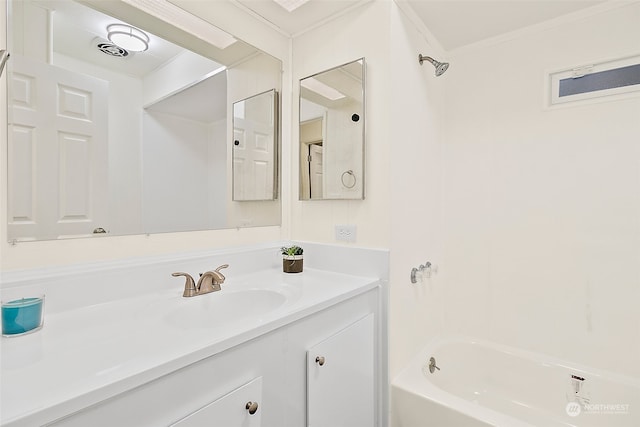 bathroom featuring shower / bathing tub combination, vanity, and crown molding