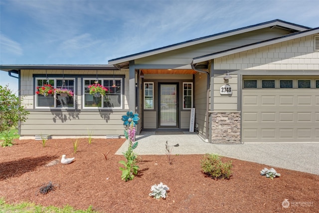 single story home with a garage