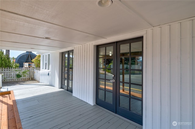 wooden terrace featuring french doors