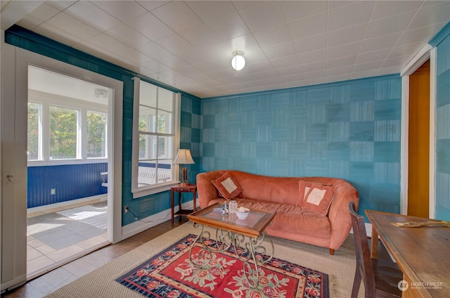 living room with tile patterned floors