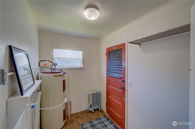 interior space featuring strapped water heater, crown molding, and radiator