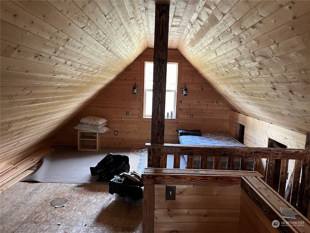 additional living space featuring wooden ceiling, lofted ceiling, and wood walls