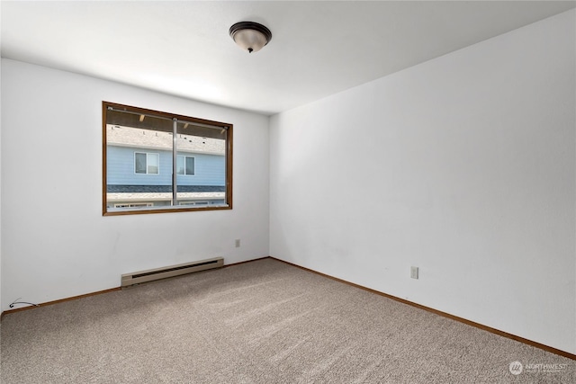 unfurnished room featuring carpet flooring and a baseboard radiator