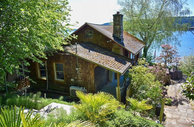 back of property with central AC unit