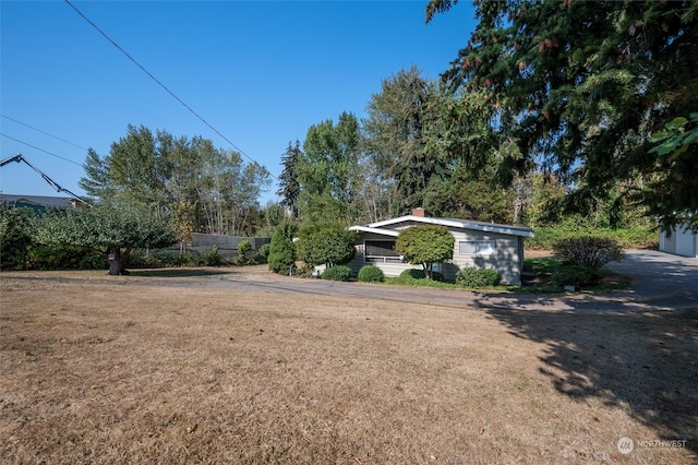 view of yard with a garage