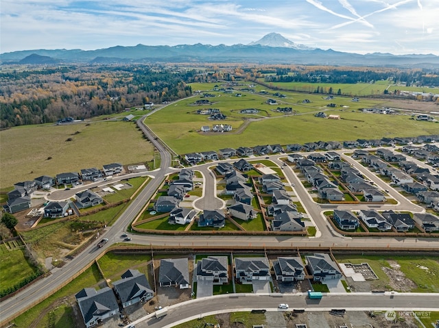 birds eye view of property featuring a mountain view