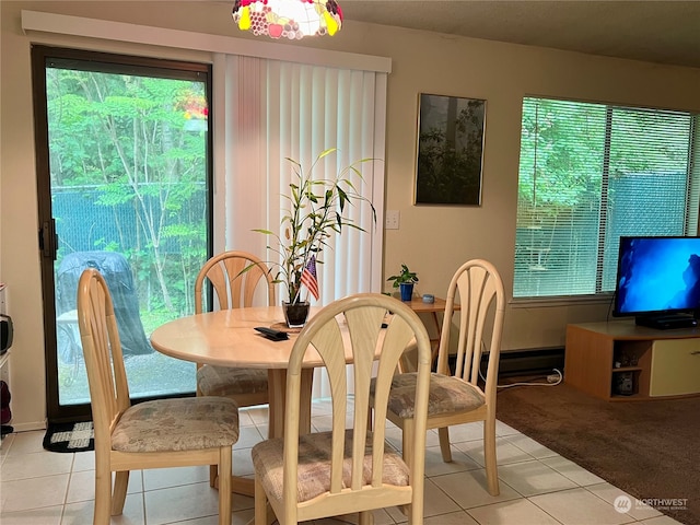 712714 142nd Pl SE, Bellevue, WA 98007 - dining area featuring light tile patterned floors and light colored carpet