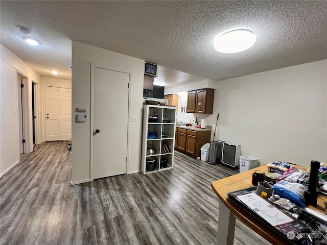 712714 142nd Pl SE, Bellevue, WA 98007 - office area featuring a textured ceiling and dark wood-style flooring