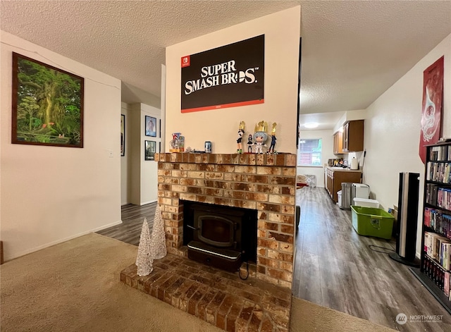 712714 142nd Pl SE, Bellevue, WA 98007 - living room with wood finished floors, a textured ceiling, and a wood stove