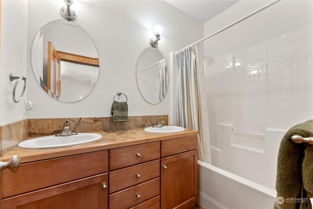 bathroom featuring vanity and shower / tub combo