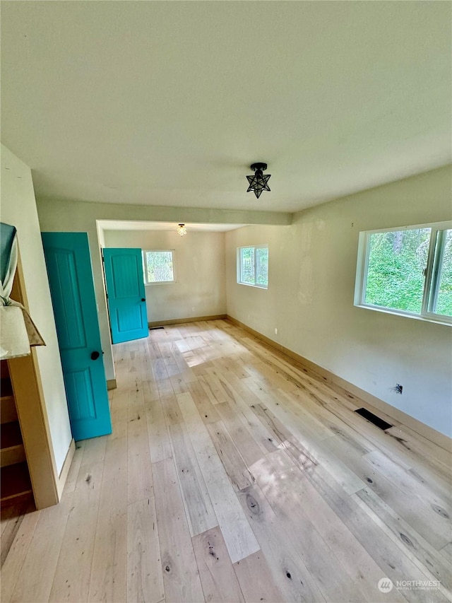 interior space with light hardwood / wood-style floors