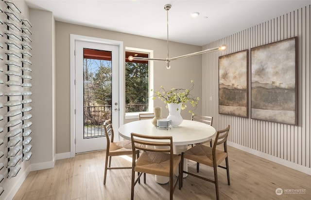 dining room with light hardwood / wood-style floors