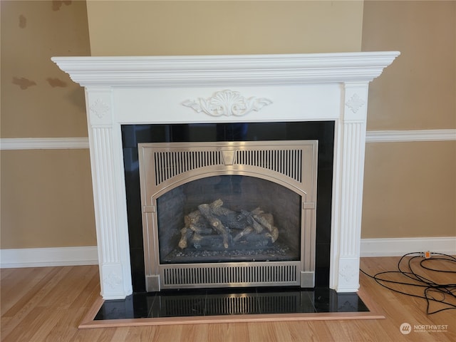 interior details with hardwood / wood-style flooring