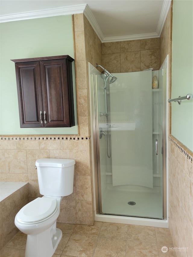 bathroom with walk in shower, tile flooring, crown molding, tile walls, and toilet