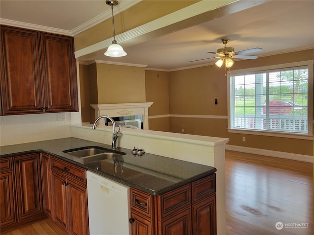 kitchen with ceiling fan, light wood-type flooring, white dishwasher, hanging light fixtures, and sink