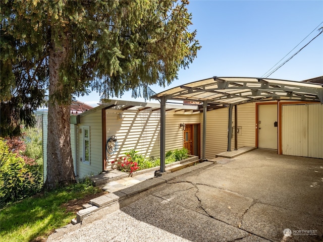 view of front facade featuring a pergola and a patio area