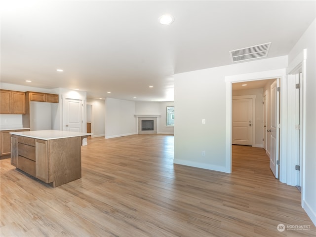 384 Emma Dr, Wenatchee, WA 98801 - kitchen featuring a kitchen island and light wood-type flooring