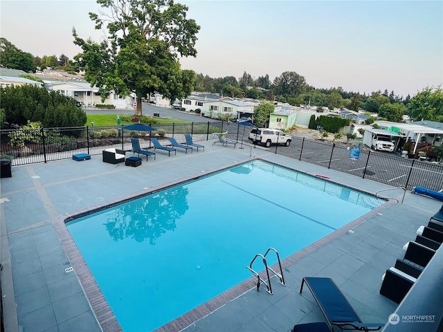 view of pool featuring a patio area