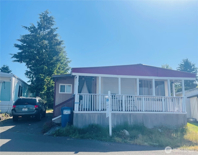 18116 36th Ave S Unit 393, Seatac, WA 98188 - manufactured / mobile home featuring a porch