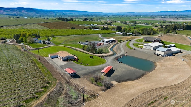 aerial view featuring a rural view and a mountain view