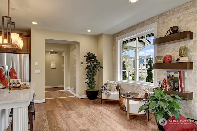 living area with light wood-type flooring