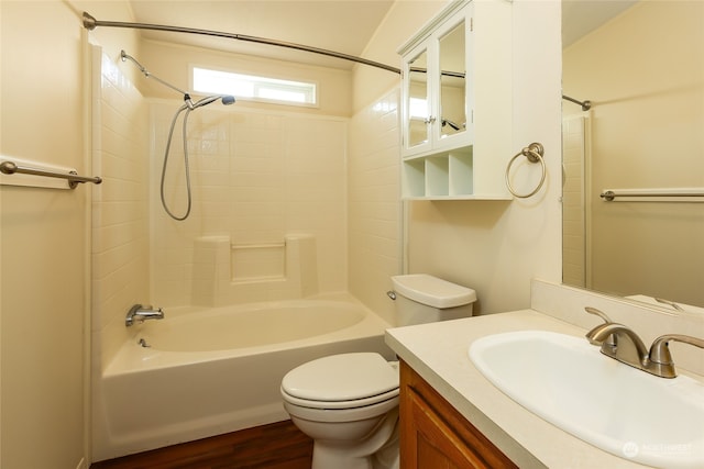 bathroom featuring vanity, shower / tub combination, toilet, and wood finished floors