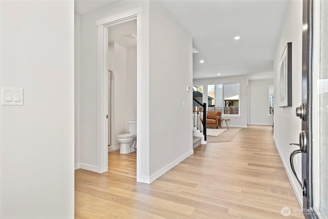 hall featuring light hardwood / wood-style flooring