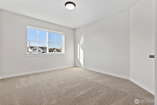 view of carpeted spare room