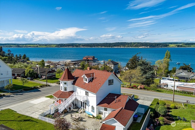 birds eye view of property featuring a water view