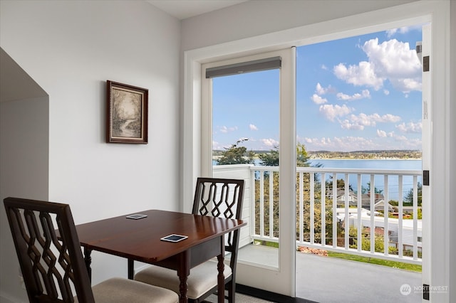 dining area with a water view