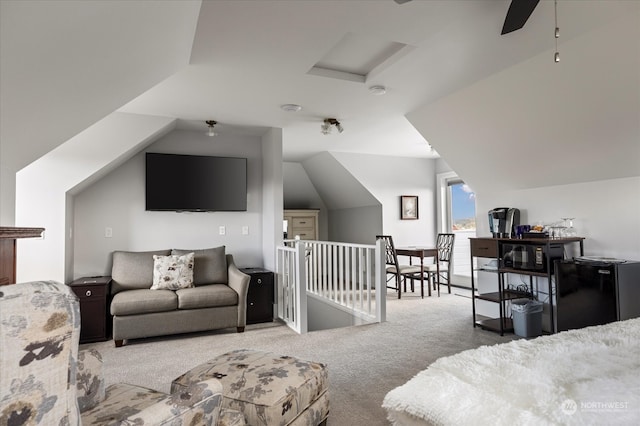 bedroom with vaulted ceiling and carpet floors