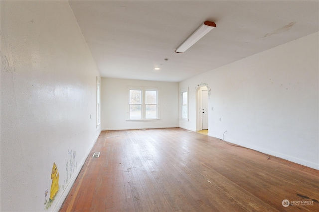 unfurnished room featuring light hardwood / wood-style floors