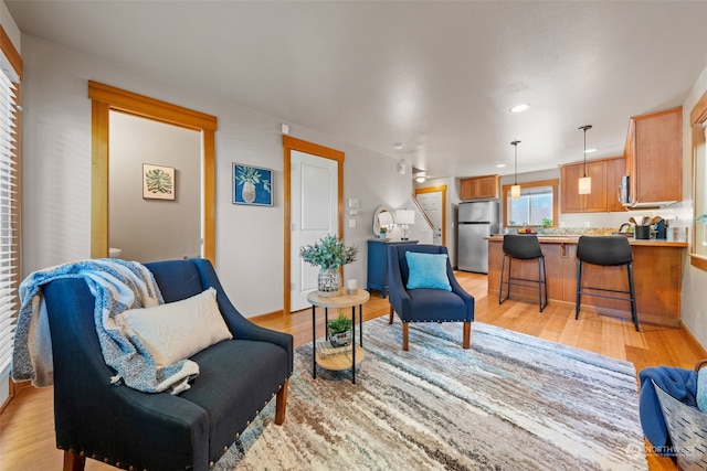 living area with light wood-type flooring