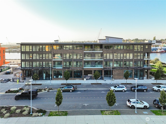 view of property with a water view