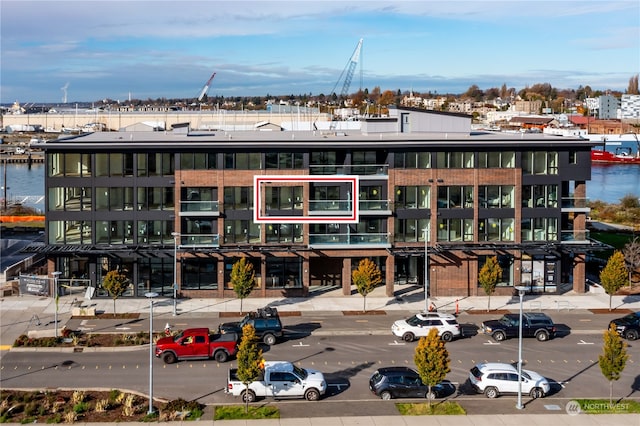 view of building exterior featuring a water view