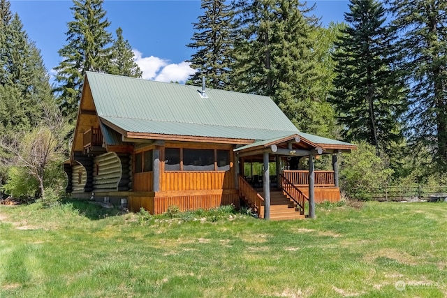 exterior space featuring a front yard