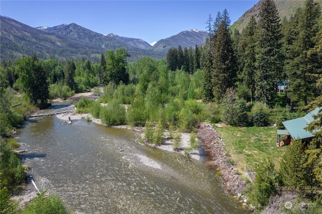 mountain view featuring a water view