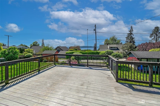 deck featuring a lawn